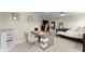 Open view of the bedroom and office space with connecting doors. Modern decor throughout at 2075 Parkhaven Ct, Roswell, GA 30076