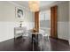 Elegant dining room with a modern chandelier and unique decor at 2075 Parkhaven Ct, Roswell, GA 30076