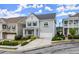 Lovely two-story home with blue siding, white trim, and a well-kept lawn on a cloudy day at 2075 Parkhaven Ct, Roswell, GA 30076
