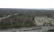 The aerial view showcases a community near lush greenery and a highway for easy access at 3445 Stratford Ne Rd # 2703, Atlanta, GA 30326