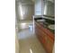 Well-lit bathroom with a double sink vanity, granite countertops, and shower-tub combo at 3445 Stratford Ne Rd # 2703, Atlanta, GA 30326
