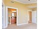 Bedroom showing ensuite bathroom with granite countertop vanity and tiled flooring at 3445 Stratford Ne Rd # 2703, Atlanta, GA 30326