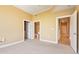 Bedroom showcasing attached bath and hallway entry, creating a seamless transition at 3445 Stratford Ne Rd # 2703, Atlanta, GA 30326