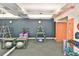 Community gym area with weights, fitness equipment, and mirrored wall at 3445 Stratford Ne Rd # 2703, Atlanta, GA 30326