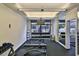 Bright fitness center equipped with weights, benches, and mirrored walls at 3445 Stratford Ne Rd # 2703, Atlanta, GA 30326