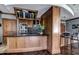 Modern kitchen features wooden cabinets, stainless steel appliances, and an open design at 3445 Stratford Ne Rd # 2703, Atlanta, GA 30326