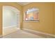 Cozy living room showcasing an arched entryway to a dining area with kitchen view at 3445 Stratford Ne Rd # 2703, Atlanta, GA 30326