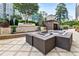 Enjoy this outdoor lounge with a fire pit, comfortable seating, and elegant landscaping at 3445 Stratford Ne Rd # 2703, Atlanta, GA 30326