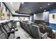 Enjoy movie nights in this theater room with plush seating and a large screen for the ultimate viewing experience at 3445 Stratford Ne Rd # 2703, Atlanta, GA 30326
