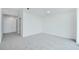 A clean and bright bedroom has neutral walls, carpet, doors and trim at 361 17Th Nw St # 1702, Atlanta, GA 30363