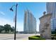 Exterior shot of a tall modern high-rise with many balconies, on a sunny day at 361 17Th Nw St # 1702, Atlanta, GA 30363