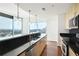 Modern kitchen featuring sleek countertops, stainless steel appliances, and bright natural lighting from large windows at 361 17Th Nw St # 1702, Atlanta, GA 30363