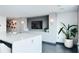Stylish kitchenette featuring a stainless steel faucet, sleek countertops, and modern décor at 361 17Th Nw St # 1702, Atlanta, GA 30363