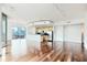 Bright and airy living space featuring hardwood floors and a modern kitchen with stunning city views at 361 17Th Nw St # 1702, Atlanta, GA 30363