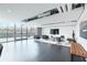 Modern lounge area with comfortable seating, a large flat screen TV, and lots of natural light at 361 17Th Nw St # 1702, Atlanta, GA 30363