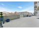 Spacious roof deck with concrete planters, city views, and plenty of room for entertaining at 361 17Th Nw St # 1702, Atlanta, GA 30363