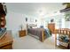 Spacious bedroom with plenty of natural light, a comfortable bed, and ample closet space at 1885 N Creek Cir, Alpharetta, GA 30009