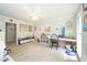 Bright and spacious playroom with carpet, ceiling fan, and room to spare at 1885 N Creek Cir, Alpharetta, GA 30009