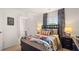 Well-lit bedroom with superhero themed decor and an attached bathroom, a great space for children at 3076 Yellowhammer Dr, Marietta, GA 30064