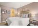 Comfortable bedroom with soft mauve walls and natural lighting, a serene retreat for relaxation at 3076 Yellowhammer Dr, Marietta, GA 30064