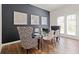Bright dining area featuring stylish chairs, a glass table, and elegant decor at 3076 Yellowhammer Dr, Marietta, GA 30064
