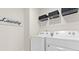 Well-lit laundry room equipped with modern appliances for convenient and efficient laundry care at 3076 Yellowhammer Dr, Marietta, GA 30064
