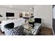 Open-concept living space showcasing a modern kitchen, dining area, and comfortable living room at 3076 Yellowhammer Dr, Marietta, GA 30064