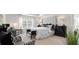 Inviting main bedroom features elegant decor, comfortable seating, and abundant natural light at 3076 Yellowhammer Dr, Marietta, GA 30064