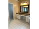 Bathroom with built in vanity, cabinets, drawers and light granite countertop at 3381 Walkers Ridge Rd, Dacula, GA 30019
