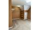 An empty walk-in closet with carpeted floors and ample shelving at 3381 Walkers Ridge Rd, Dacula, GA 30019