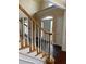 Inviting foyer featuring a wooden staircase and view of the front door with high ceilings at 3381 Walkers Ridge Rd, Dacula, GA 30019