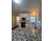 Modern kitchen with white cabinets, granite countertops, stainless steel appliances and natural light at 3381 Walkers Ridge Rd, Dacula, GA 30019