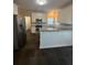 Spacious kitchen with stainless steel appliances, white cabinets, and granite countertops at 3381 Walkers Ridge Rd, Dacula, GA 30019