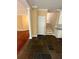 Open concept living space featuring hardwood floors, tile and staircase at 3381 Walkers Ridge Rd, Dacula, GA 30019