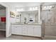 Bright bathroom offers a walk-in shower and double sink vanity at 4012 Townsend Ln, Dunwoody, GA 30346