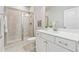 Bright bathroom featuring a glass enclosed shower and white vanity at 4012 Townsend Ln, Dunwoody, GA 30346