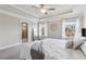 Stylish bedroom features large windows and an ensuite bathroom at 4012 Townsend Ln, Dunwoody, GA 30346