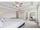 Large bedroom with ceiling fan and ensuite bathroom at 4012 Townsend Ln, Dunwoody, GA 30346