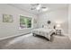 Cozy bedroom features carpeted floors and a window with natural light at 4012 Townsend Ln, Dunwoody, GA 30346