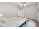 Cozy bedroom features plush carpet, ceiling fan and neutral tones at 4012 Townsend Ln, Dunwoody, GA 30346