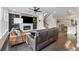 Hardwood floors and fireplace in the spacious living room, which is open to the kitchen at 4012 Townsend Ln, Dunwoody, GA 30346