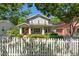 Charming two-story home with white picket fence, lush landscaping, and an inviting front porch at 629 2Nd Avenue, Decatur, GA 30030