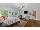 Spacious main bedroom with access to a deck and walk-in closet at 629 2Nd Avenue, Decatur, GA 30030