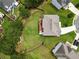 Aerial view of the home showcasing the expansive backyard and well-maintained landscaping at 909 Shatley Dr, Stockbridge, GA 30281