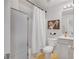 Small bathroom with a shower and a white curtain at 909 Shatley Dr, Stockbridge, GA 30281