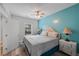 Bedroom featuring a ceiling fan and a large window at 909 Shatley Dr, Stockbridge, GA 30281