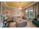 Comfortable living room with stylish decor, a chandelier, and bright natural light at 909 Shatley Dr, Stockbridge, GA 30281