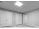 View of basement area featuring new carpet and multiple closet spaces at 1010 Longcreek Pointe, Alpharetta, GA 30005