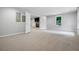 Finished basement space featuring new carpet, neutral paint, and open layout at 1010 Longcreek Pointe, Alpharetta, GA 30005