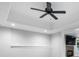 The finished basement features a ceiling fan, stone fireplace, and neutral paint at 1010 Longcreek Pointe, Alpharetta, GA 30005